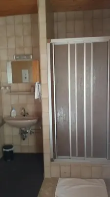 Ein Badezimmer in der Unterkunft Hotel Pension Winzerhaus