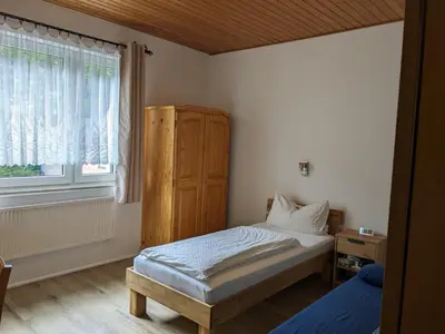 Ein Bett oder Betten in einem Zimmer der Unterkunft Hotel Pension Winzerhaus