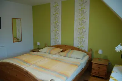 Ein Bett oder Betten in einem Zimmer der Unterkunft Weingut Klein-Götz