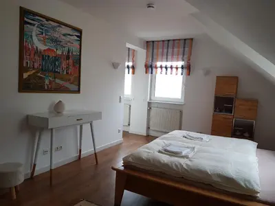 Ein Bett oder Betten in einem Zimmer der Unterkunft Villa Feyen in Trier