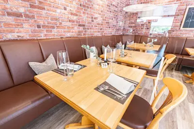 Ein Sitzbereich in der Unterkunft Landhotel Ringelsteiner Mühle