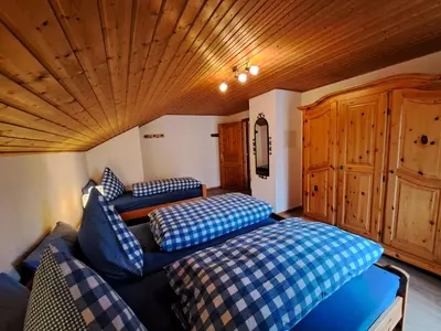 Ein Bett oder Betten in einem Zimmer der Unterkunft Ferienwohnung Martin
