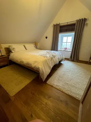 Ein Bett oder Betten in einem Zimmer der Unterkunft The little Stone House