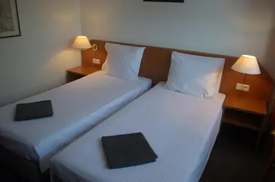 Ein Bett oder Betten in einem Zimmer der Unterkunft Niedereher Mühle