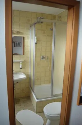 Ein Badezimmer in der Unterkunft Niedereher Mühle