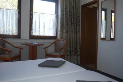 Ein Bett oder Betten in einem Zimmer der Unterkunft Niedereher Mühle