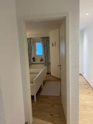 Ein Bett oder Betten in einem Zimmer der Unterkunft Ferienwohung Auszeit am Eifelsteig