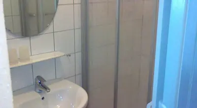 Ein Badezimmer in der Unterkunft Gästehaus zum Moseltal