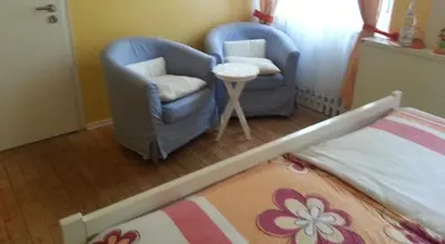 Ein Bett oder Betten in einem Zimmer der Unterkunft Gästehaus zum Moseltal