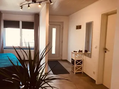Ein Sitzbereich in der Unterkunft Ferienwohnung Am Bachlauf