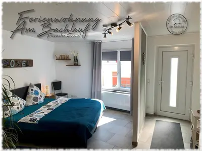 Ein Sitzbereich in der Unterkunft Ferienwohnung Am Bachlauf