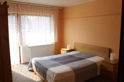 Ein Bett oder Betten in einem Zimmer der Unterkunft Ferienwohnung Hofmann
