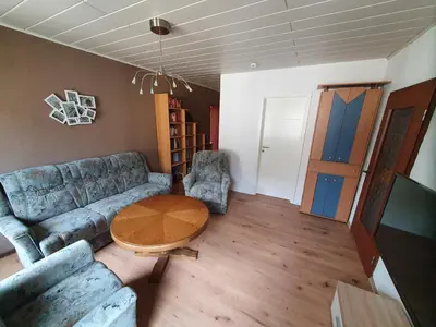 Ein Sitzbereich in der Unterkunft Ferienwohnung Hofmann