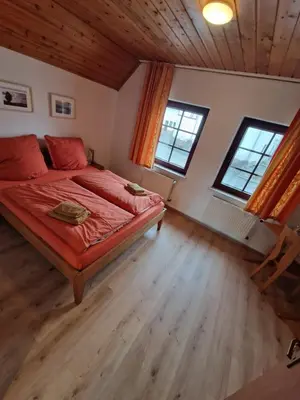 Ein Bett oder Betten in einem Zimmer der Unterkunft Eifel Ferienhaus Luna