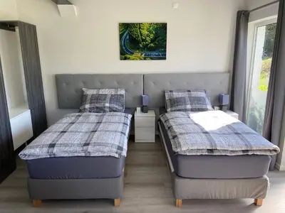 Ein Bett oder Betten in einem Zimmer der Unterkunft Kallenhard View Apartments