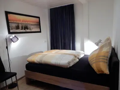 Ein Bett oder Betten in einem Zimmer der Unterkunft Altstadt Charme