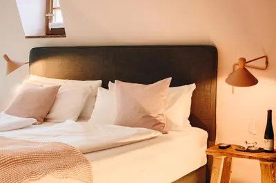 Ein Bett oder Betten in einem Zimmer der Unterkunft Boutiquehotel Kloster Pfalzel