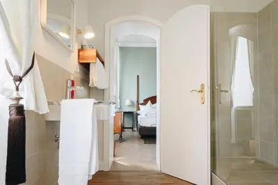 Ein Bett oder Betten in einem Zimmer der Unterkunft Boutiquehotel Kloster Pfalzel