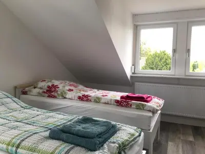 Ein Bett oder Betten in einem Zimmer der Unterkunft Apartment Ehrenbreitstein