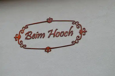 Ein Zertifikat, Auszeichnung, Logo oder anderes Dokument, das in der Unterkunft Beim Hooch 