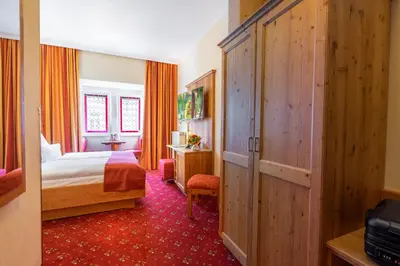 Ein Bett oder Betten in einem Zimmer der Unterkunft Altkölnischer Hof