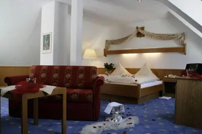 Ein Bett oder Betten in einem Zimmer der Unterkunft Bengel's Hotel zur Krone