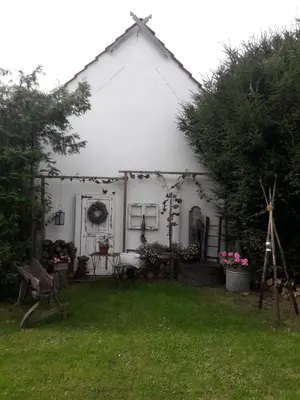 Ein Garten an der Unterkunft Altes Weingut Weinhaus Rebstock