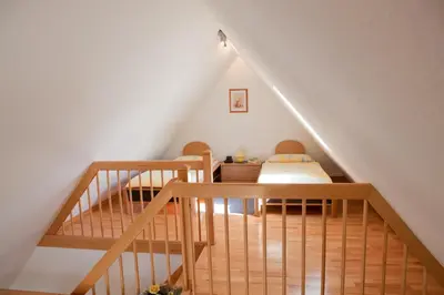 Ein Bett oder Betten in einem Zimmer der Unterkunft Ferienweingut Pies Ellenz-Poltersdorf