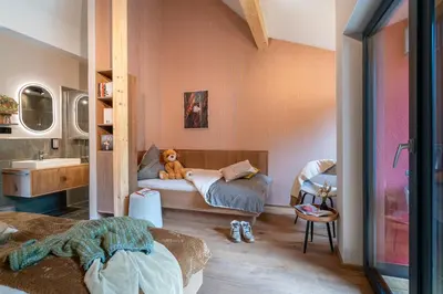 Ein Bett oder Betten in einem Zimmer der Unterkunft Hotel Schmausemühle