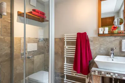 Ein Badezimmer in der Unterkunft Hotel Schmausemühle