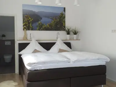 Ein Bett oder Betten in einem Zimmer der Unterkunft York Cottage Heaven