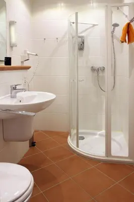 Ein Badezimmer in der Unterkunft Hotel Rheinkönig