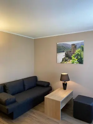 Ein Sitzbereich in der Unterkunft FETZ DAS LORELEY HOTEL