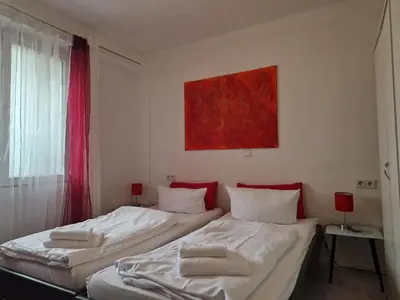Ein Bett oder Betten in einem Zimmer der Unterkunft Ricks City Hotel