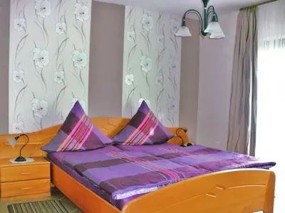 Ein Bett oder Betten in einem Zimmer der Unterkunft Gästehaus Ruth Andrae