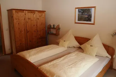 Ein Bett oder Betten in einem Zimmer der Unterkunft Nationalpark-Gastgeber Eifel