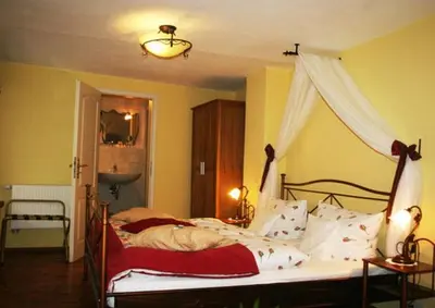 Ein Bett oder Betten in einem Zimmer der Unterkunft Märchenhotel