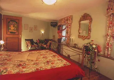 Ein Bett oder Betten in einem Zimmer der Unterkunft Märchenhotel