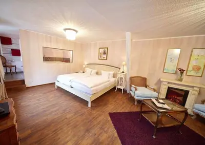 Ein Bett oder Betten in einem Zimmer der Unterkunft Märchenhotel