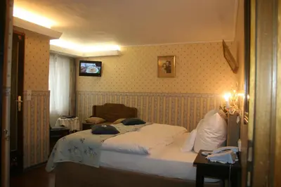 Ein Bett oder Betten in einem Zimmer der Unterkunft Märchenhotel