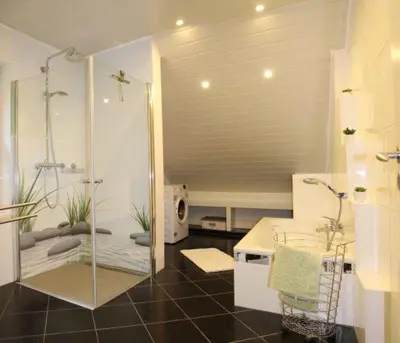 Ein Badezimmer in der Unterkunft Im Corveyer Wäldchen