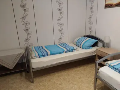 Ein Bett oder Betten in einem Zimmer der Unterkunft FeWo Schwalbennest