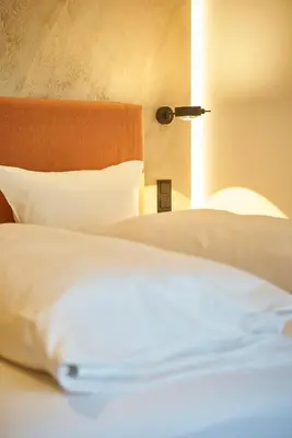 Ein Bett oder Betten in einem Zimmer der Unterkunft Hotel Reiler Hof