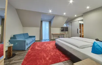 Ein Bett oder Betten in einem Zimmer der Unterkunft Hotel Reiler Hof