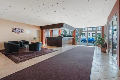 Ein Sitzbereich in der Unterkunft Hotel Imota