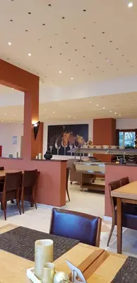 Ein Restaurant oder anderes Speiselokal in der Unterkunft Hotel Imota