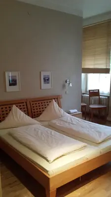 Ein Bett oder Betten in einem Zimmer der Unterkunft Hotel Restaurant Frankenturm