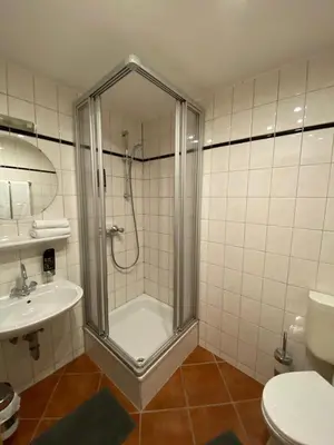 Ein Badezimmer in der Unterkunft Hotel Restaurant Frankenturm