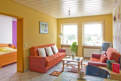 Ein Sitzbereich in der Unterkunft Ferienwohnung Nisius