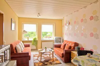 Ein Sitzbereich in der Unterkunft Ferienwohnung Nisius